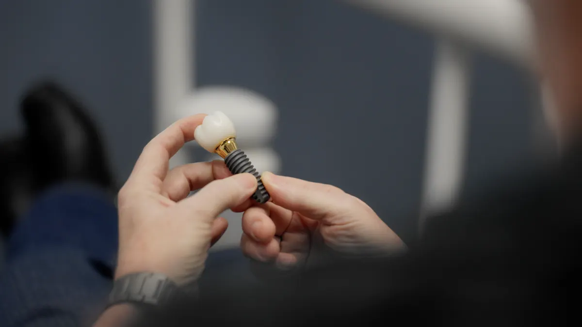 Implant model being shown to a patient