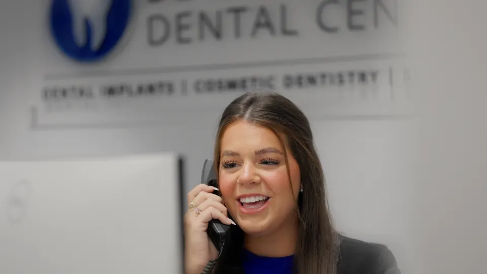 Front desk team member answering the phone