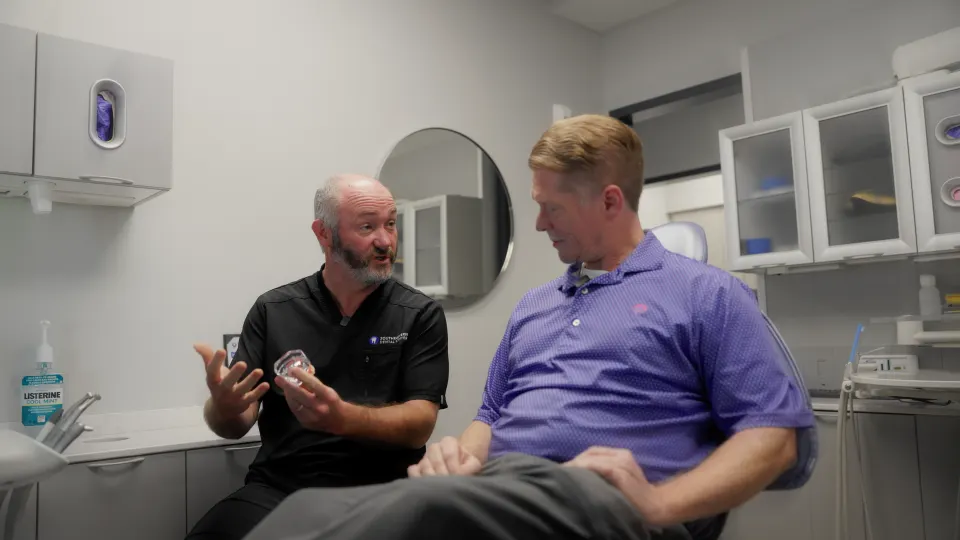 Doctor talking through a treatment plan with a patient